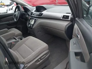 2017 Honda Odyssey SE with VIN 5FNRL5H34HB009081, listed as a IAAI auction lot 41701429 with 72,131 mi miles and . Bid and sale history available at carsss.com. Image 5.