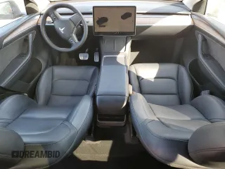 2023 Tesla Model Y Performance with VIN 7SAYGDEF7PF924355, listed as a Copart auction lot 47877055 with 64,663 mi miles and Salvage Title. Bid and sale history available at DreamBid. Image 8.