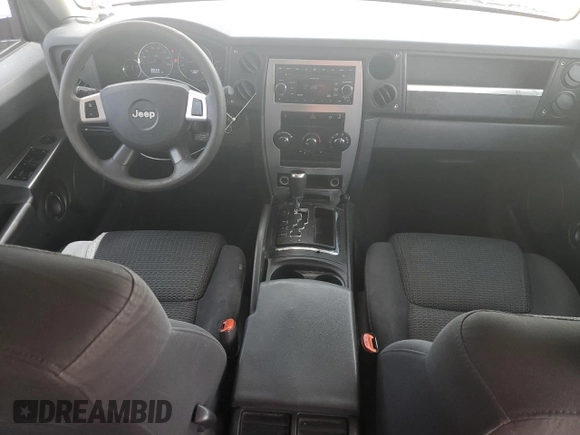 2008 Jeep Commander Sport z VIN 1J8HH48K58C126172, wystawiony jako Copart lot #61961285 z przebiegiem 235 022 mil mil oraz Szkoda całkowita • Salvage title. Historia ofert i sprzedaży dostępna na DreamBid. Obrazek 8.