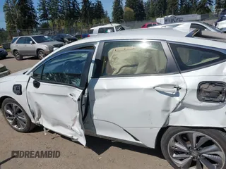 2019 Honda Clarity with VIN JHMZC5F1XKC007033, listed as a IAAI auction lot 42064611 with 28,458 mi miles. Bid and sale history available at carsss.com. Image 14.