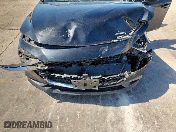 2021 Mazda 3 S with VIN JM1BPAAL1M1303601, listed as a Copart auction lot 63101125 with 82,041 mi miles and Salvage title. Bid and sale history available at DreamBid. Image 11.