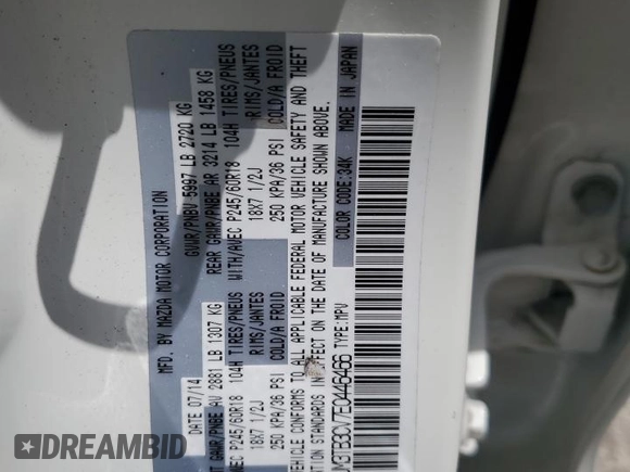 2014 Mazda CX-9 Touring z VIN JM3TB3CV7E0446466, wystawiony jako Copart lot #57631565 z przebiegiem 91 831 mil mil oraz Szkoda całkowita • Salvage title. Historia ofert i sprzedaży dostępna na DreamBid. Obrazek 13.