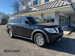2017 Nissan Armada SV z VIN JN8AY2NC1H9504189, wystawiony jako Copart lot #58663705 z przebiegiem 203 864 mil mil oraz Czysty tytuł • Clean title. Historia ofert i sprzedaży dostępna na DreamBid. Obrazek 1.