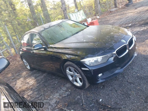 2015 BMW 3 Series 328i with VIN WBA3A5C59FF609332, listed as a IAAI auction lot 41994091 with 194,245 mi miles. Bid and sale history available at carsss.com. Image 1.