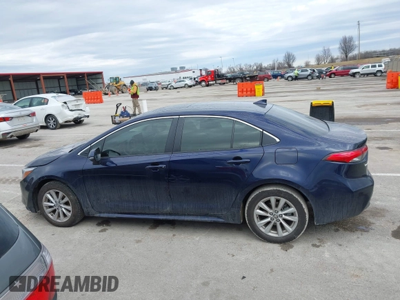 2023 Toyota Corolla Hybrid LE with VIN JTDBCMFE7PJ001872, listed as a IAAI auction lot 41529174 with 13,838 mi miles. Bid and sale history available at carsss.com. Image 14.