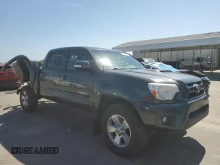 2015 Toyota Tacoma with VIN 3TMMU4FN7FM078006, listed as a Copart auction lot 59129495 with 244,062 mi miles and Salvage title. Bid and sale history available at DreamBid. Image 4.