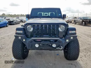 2021 Jeep Gladiator Freedom with VIN 1C6HJTAG8ML580882, listed as a Copart auction lot 57690885 with Not provided miles and Salvage title. Bid and sale history available at DreamBid. Image 5.