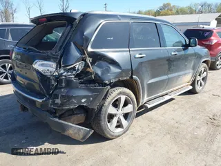 2014 Jeep Grand Cherokee Limited with VIN 1C4RJFBT3EC195354, listed as a IAAI auction lot 42031013 with 168,304 mi miles and . Bid and sale history available at DreamBid. Image 4.