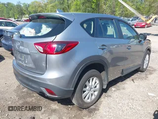 2013 Mazda CX-5 Sport z VIN JM3KE2BE9D0132928, wystawiony jako IAAI lot #41997589 z przebiegiem Nie podano mil oraz . Historia ofert i sprzedaży dostępna na DreamBid. Obrazek 4.