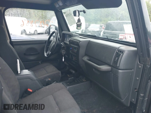 2004 Jeep Wrangler X with VIN 1J4FA39S94P707411, listed as a IAAI auction lot 42187856 with 189,519 mi miles. Bid and sale history available at carsss.com. Image 5.
