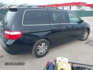 2006 Honda Odyssey EX-L with VIN 5FNRL38756B448827, listed as a IAAI auction lot 41952352 with 108,771 mi miles. Bid and sale history available at carsss.com. Image 4.