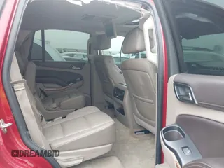 2015 Chevrolet Tahoe LTZ z VIN 1GNSKCKC6FR276531, wystawiony jako IAAI lot #41692617 z przebiegiem 124 010 mil mil oraz . Historia ofert i sprzedaży dostępna na DreamBid. Obrazek 8.