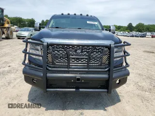 2017 Nissan Titan Platinum Reserve z VIN 1N6BA1F45HN552823, wystawiony jako Copart lot #58463895 z przebiegiem 157 375 mil mil oraz Tytuł czysty. Historia ofert i sprzedaży dostępna na DreamBid. Obrazek 5.