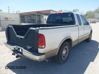 2003 Ford F-150 XL with VIN 1FTRX17L03NA16778, listed as a IAAI auction lot 41602179 with 219,101 mi miles. Bid and sale history available at carsss.com. Image 4.
