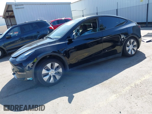 2024 Tesla Model Y Long Range z VIN 7SAYGDEE0RF078242, wystawiony jako IAAI lot #41808826 z przebiegiem 59 581 mil mil oraz . Historia ofert i sprzedaży dostępna na DreamBid. Obrazek 2.