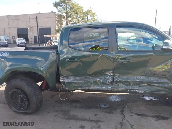 2021 Toyota Tacoma 4WD SR with VIN 3TMCZ5AN4MM401998, listed as a IAAI auction lot 41712813 with 91,371 mi miles. Bid and sale history available at carsss.com. Image 6.