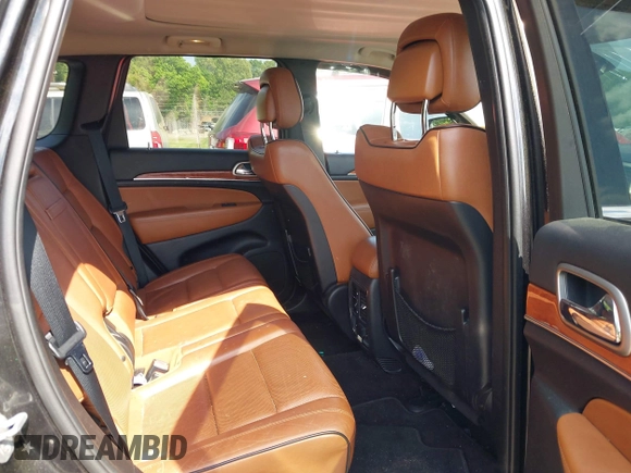 2013 Jeep Grand Cherokee Overland with VIN 1C4RJECT3DC526005, listed as a IAAI auction lot 42064151 with 112,777 mi miles and . Bid and sale history available at DreamBid. Image 8.