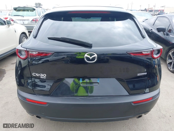 2024 Mazda CX-30 2.5 S Preferred Package with VIN 3MVDMBCMXRM669336, listed as a IAAI auction lot 41895722 with 23,554 mi miles. Bid and sale history available at carsss.com. Image 17.