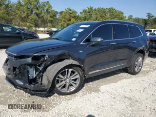 2022 Cadillac XT6 Premium Luxury with VIN 1GYKPCRS1NZ104567, listed as a Copart auction lot 47173005 with 54,541 mi miles and Clean Title. Bid and sale history available at carsss.com. Image 1.
