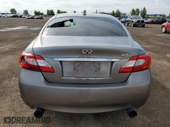 2011 Infiniti M with VIN JN1BY1ARXBM370844, listed as a Copart auction lot 62425515 with 277,315 mi miles and Salvage title. Bid and sale history available at DreamBid. Image 6.