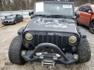 2008 Jeep Wrangler Unlimited Sahara with VIN 1J4GA59168L580525, listed as a Copart auction lot 47147905 with 223,138 mi miles and Salvage Title. Bid and sale history available at carsss.com. Image 5.