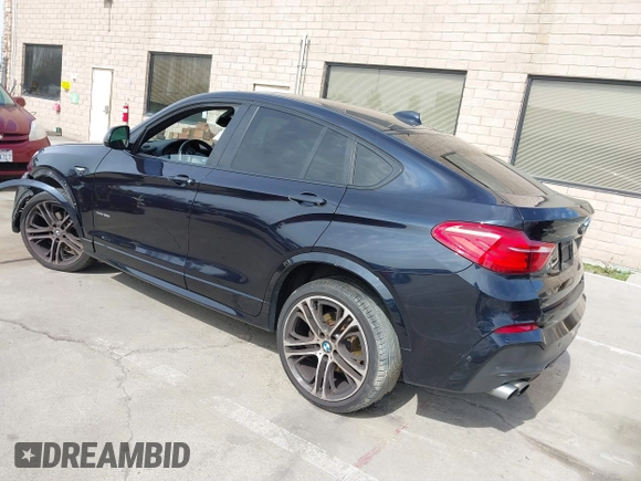 2015 BMW X4 xDrive35i with VIN 5UXXW5C50F0E87728, listed as a IAAI auction lot 41819628 with 136,042 mi miles and . Bid and sale history available at DreamBid. Image 3.