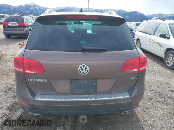 2013 Volkswagen Touareg Lux with VIN WVGEF9BP1DD012851, listed as a IAAI auction lot 41732391 with 123,283 mi miles and . Bid and sale history available at DreamBid. Image 17.