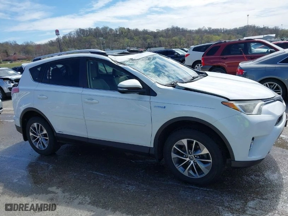 2016 Toyota RAV4 Hybrid XLE with VIN JTMRJREV1GD017731, listed as a IAAI auction lot 41860447 with 115,787 mi miles. Bid and sale history available at carsss.com. Image 14.