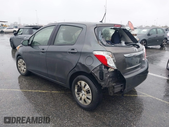 2013 Toyota Yaris L with VIN JTDKTUD39DD552185, listed as a IAAI auction lot 41577259 with 159,662 mi miles. Bid and sale history available at carsss.com. Image 3.