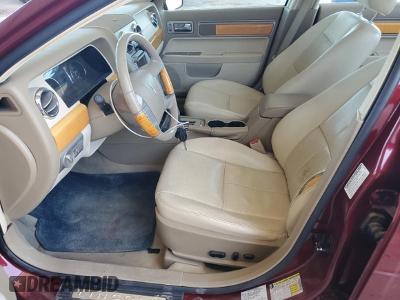 2007 Lincoln MKZ z VIN 3LNHM26T67R633256, wystawiony jako Copart lot #61353005 z przebiegiem 108 106 mil mil oraz Szkoda całkowita • Salvage title. Historia ofert i sprzedaży dostępna na DreamBid. Obrazek 7.