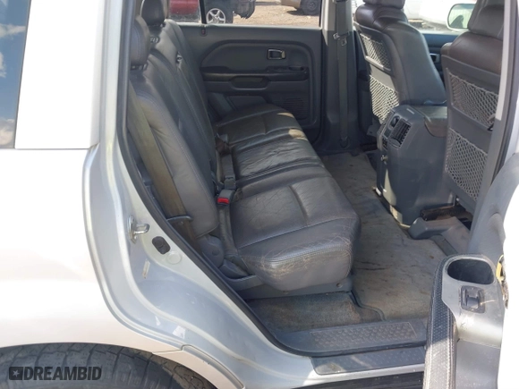 2003 Honda Pilot EX with VIN 2HKYF18693H591369, listed as a IAAI auction lot 41518617 with 325,658 mi miles. Bid and sale history available at carsss.com. Image 8.
