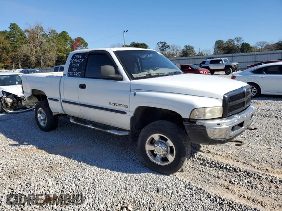 1999 Dodge 2500 with VIN 1B7KF23Z6XJ558288, listed as a Copart auction lot 86252004 with 251,023 mi miles and Salvage title. Bid and sale history available at DreamBid. Image 4.