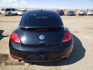 2014 Volkswagen Beetle Turbo R-Line with VIN 3VWVT7AT4EM606319, listed as a Copart auction lot 70489824 with Not Provided miles and Salvage Title. Bid and sale history available at DreamBid. Image 6.