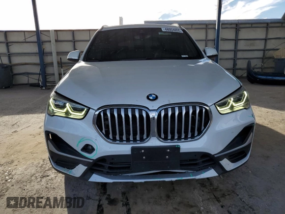 2021 BMW X1 sDrive28i z VIN WBXJG7C01M5T08696, wystawiony jako Copart lot #48004855 z przebiegiem 37 593 mil mil oraz Szkody całkowita. Historia ofert i sprzedaży dostępna na DreamBid. Obrazek 5.