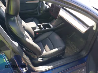2023 Tesla Model 3 with VIN 5YJ3E1EA2PF690335, listed as a IAAI auction lot 41732701 with 22,238 mi miles and . Bid and sale history available at DreamBid. Image 5.