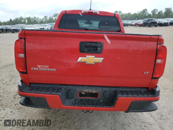 2019 Chevrolet Colorado 2WD LT with VIN 1GCGSCEA9K1315761, listed as a Copart auction lot 54943055 with 132,950 mi miles and Salvage title. Bid and sale history available at DreamBid. Image 6.