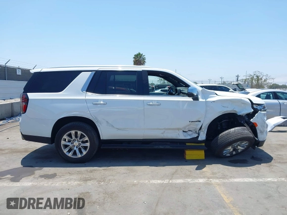 2023 Chevrolet Tahoe Premier with VIN 1GNSKSKD0PR262516, listed as a IAAI auction lot 42473875 with 83,461 mi miles and . Bid and sale history available at DreamBid. Image 13.