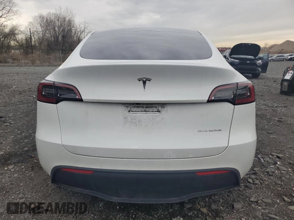 2023 Tesla Model Y Long Range with VIN 7SAYGDEE0PF746778, listed as a Copart auction lot 52704965 with 19,047 mi miles and Salvage Title. Bid and sale history available at DreamBid. Image 6.