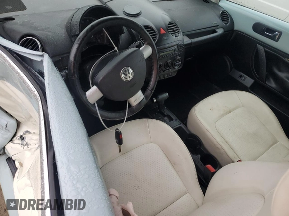 2010 Volkswagen Beetle with VIN 3VWRG3AL7AM006001, listed as a Copart auction lot 56973285 with Not provided miles and Salvage title. Bid and sale history available at DreamBid. Image 8.