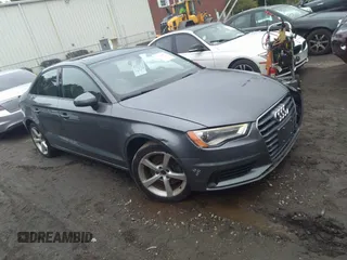 2015 Audi A3 Premium z VIN WAUACGFF4F1074943, wystawiony jako IAAI lot #41537736 z przebiegiem 131 245 mil mil oraz . Historia ofert i sprzedaży dostępna na DreamBid. Obrazek 1.