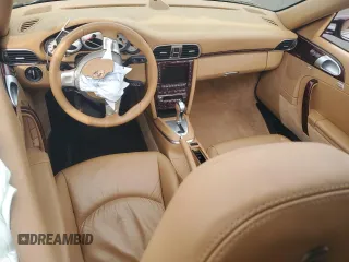 2006 Porsche 911 Carrera S z VIN WP0CB29956S769773, wystawiony jako Copart lot #54702225 z przebiegiem Nie podano mil oraz Szkoda całkowita • Salvage title. Historia ofert i sprzedaży dostępna na DreamBid. Obrazek 8.