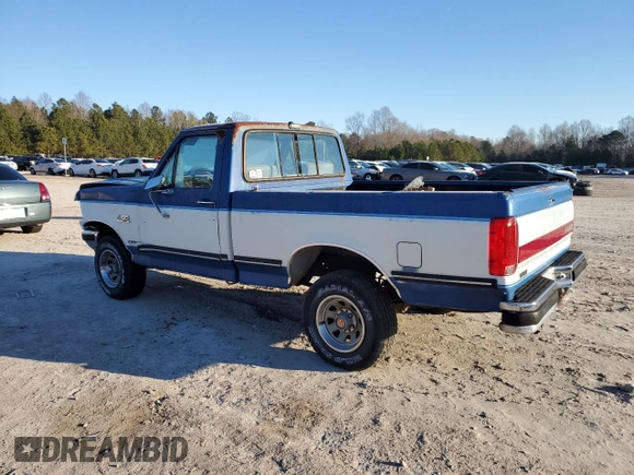1990 Ford F-150 with VIN 1FTEF14N1LNA30373, listed as a Copart auction lot 85961874 with 27,509 mi miles and Salvage Title. Bid and sale history available at carsss.com. Image 2.