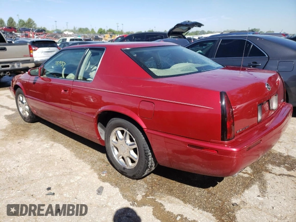 2000 Cadillac Eldorado Touring ETC z VIN 1G6ET129XYU191433, wystawiony jako Copart lot #58108224 z przebiegiem 76 957 mil mil oraz Szkody całkowita. Historia ofert i sprzedaży dostępna na DreamBid. Obrazek 2.
