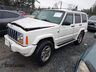 2000 Jeep Cherokee Classic with VIN 1J4FF58S4YL136213, listed as a IAAI auction lot 41227447 with 327,570 mi miles. Bid and sale history available at carsss.com. Image 2.