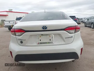 2021 Toyota Corolla Hybrid LE with VIN JTDEAMDE6MJ008815, listed as a IAAI auction lot 41586643 with 7,548 mi miles. Bid and sale history available at carsss.com. Image 16.