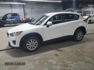 2016 Mazda CX-5 Sport z VIN JM3KE4BY9G0916276, wystawiony jako Copart lot #59907845 z przebiegiem 94 414 mil mil oraz Czysty tytuł • Clean title. Historia ofert i sprzedaży dostępna na DreamBid. Obrazek 1.