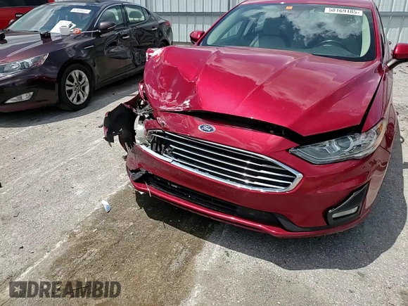 2020 Ford Fusion SE z VIN 3FA6P0HD3LR122424, wystawiony jako Copart lot #58169185 z przebiegiem 110 882 mil mil oraz Szkoda całkowita • Salvage title. Historia ofert i sprzedaży dostępna na DreamBid. Obrazek 14.