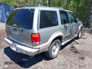 1999 Ford Explorer XLT с VIN 1FMDU34E2XUA07544, выставлен на аукционе IAAI как лот 42211210 с пробегом 156 786 миль миль и . История ставок и продаж доступна на DreamBid. Изображение 4.