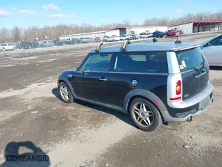 2009 MINI Cooper Clubman S with VIN WMWMM33559TP74672, listed as a IAAI auction lot 41352619 with 163,129 mi miles. Bid and sale history available at carsss.com. Image 3.