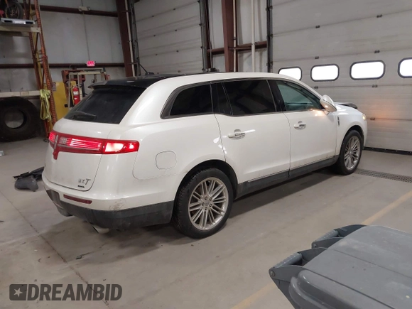 2013 Lincoln MKT EcoBoost with VIN 2LMHJ5AT3DBL56954, listed as a IAAI auction lot 41705877 with 148,771 mi miles. Bid and sale history available at carsss.com. Image 4.
